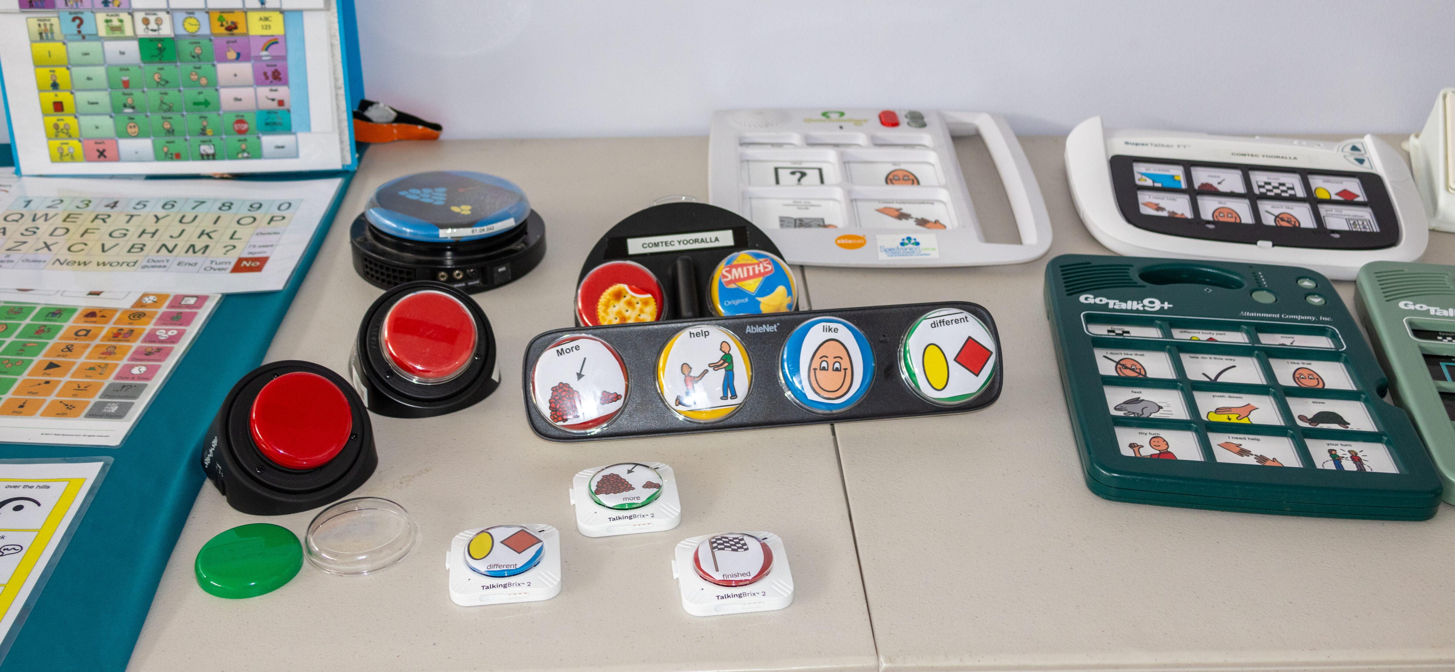 A range of static communication devices displayed on a table.