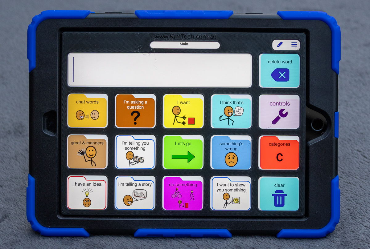 An iPad displaying the SimPODD app page set with a 3D printed keyguard.