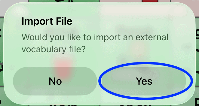 Popup screen in TouchChat asking “Would you like to import an external vocabulary file?” with the Yes button highlighted.