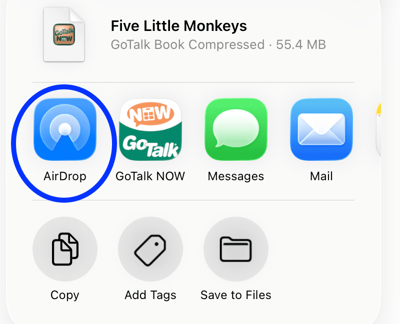 Screenshot of iPad share menu with AirDrop highlighted alongside options like GoTalk NOW, Messages, and Mail.
